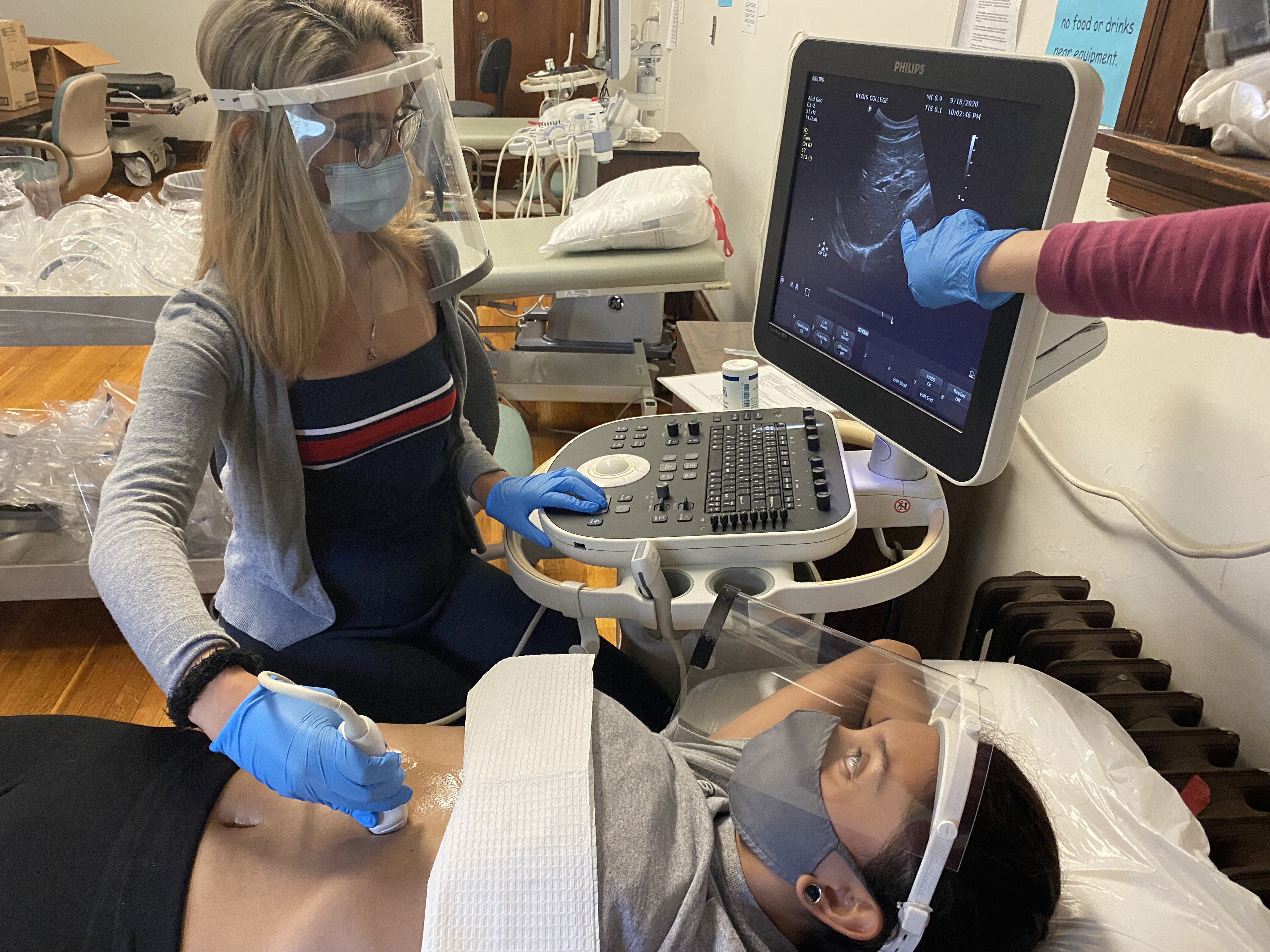 Student giving ultrasound