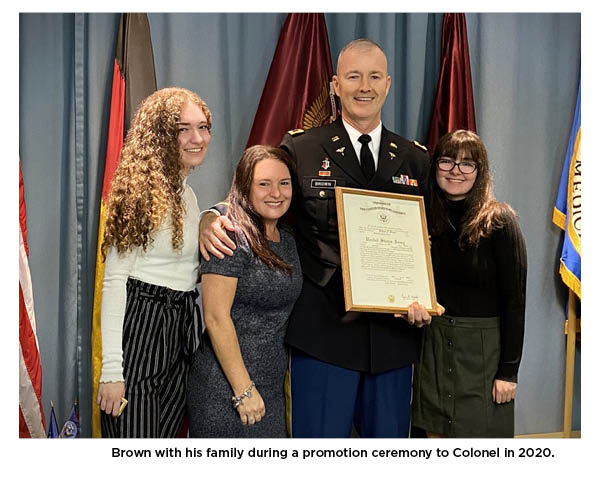 Brown with his family during a promotion ceremony to Colonel in 2020.